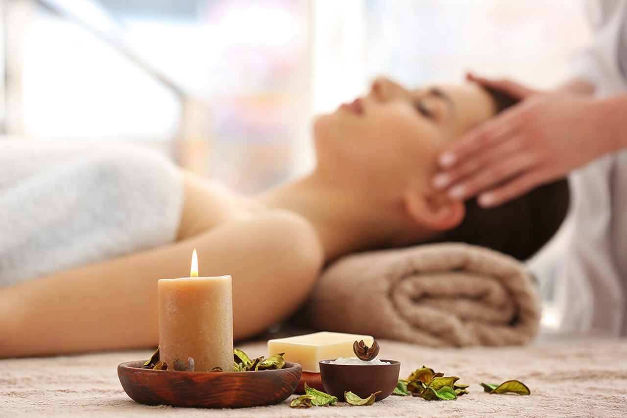 a woman laying for the aromatherapy massage